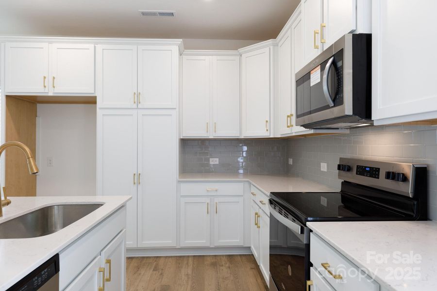 Furnished interior view inside a new home in , Charlotte (Image 6).