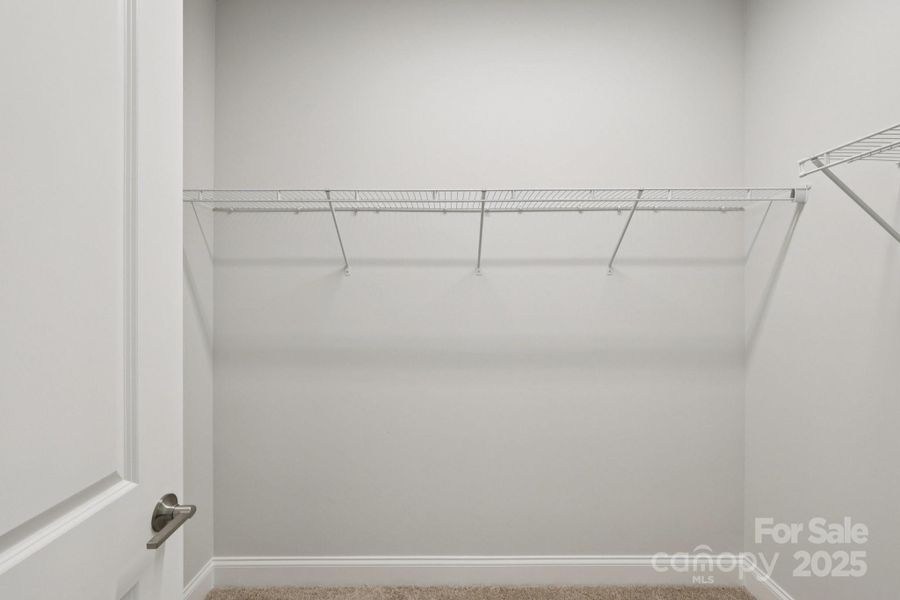 Spacious, unfurnished interior of a new home in Walk23, Huntersville (Image 34).