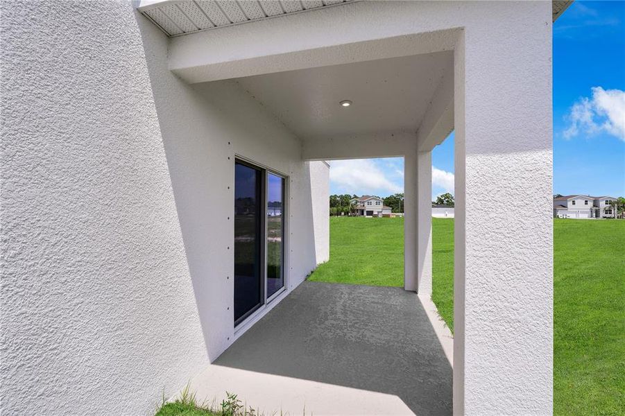 Exterior details and patio area of a home in Hidden Cove, Eustis (Image 23).