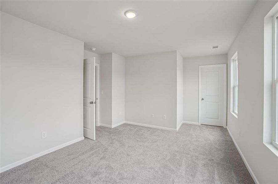 Spacious, unfurnished interior of a new home in Arrowhead By The Lake, Lizella (Image 16).