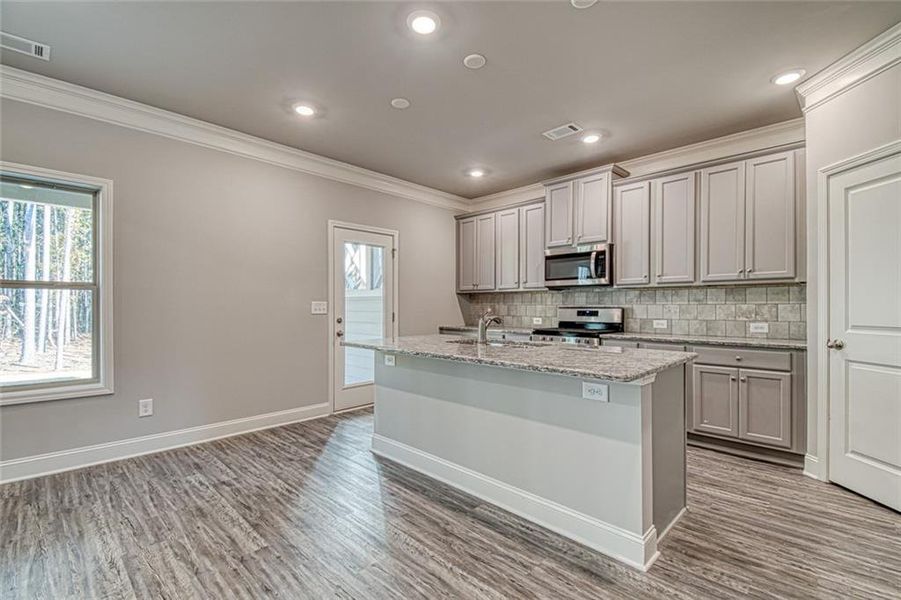 Furnished interior view inside a new home in Enclave at Logan Point, Loganville (Image 4).