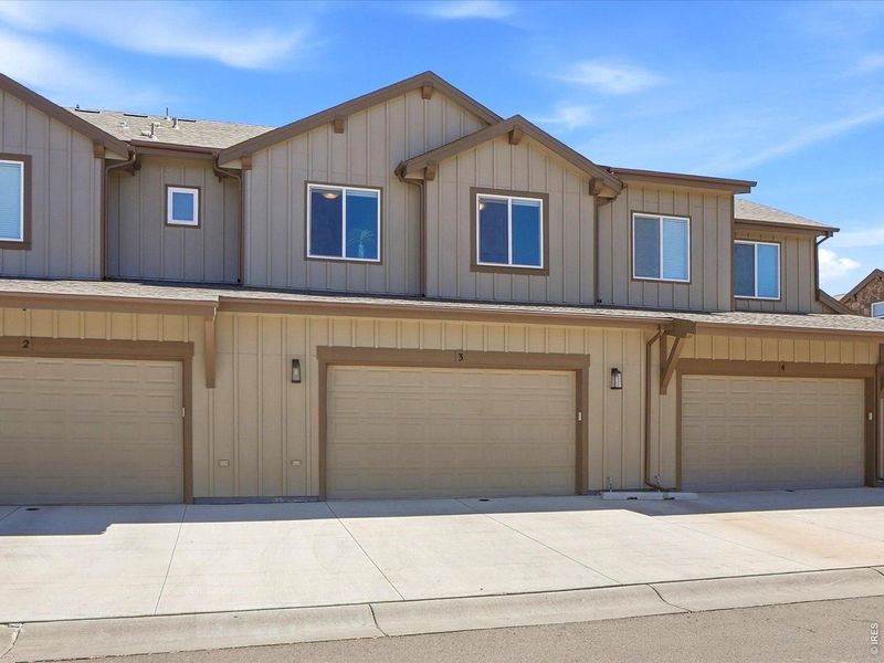 Front exterior of a new home in , Windsor, CO, highlighting curb appeal (Image 25).