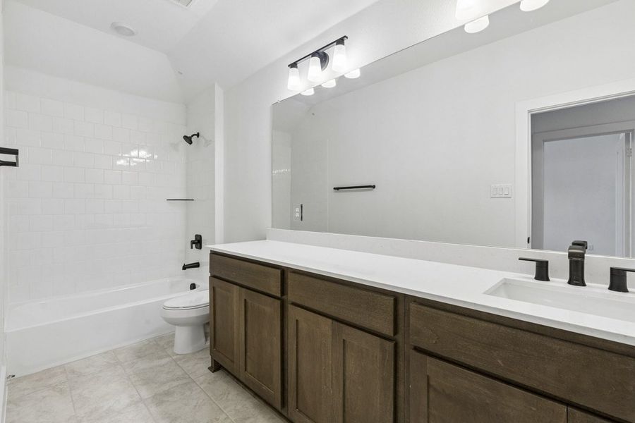 Furnished interior view inside a new home in Brahman Ranch, Venus (Image 14).
