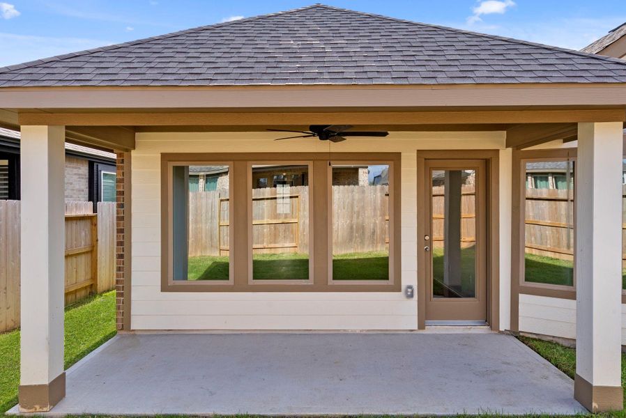 Exterior details and patio area of a home in Grand Central Park, Conroe (Image 22).