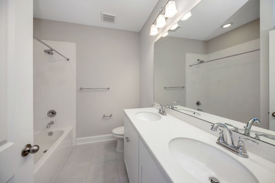Representative furnished interior of a home built from the Walton by Riverside Homes in Mariposa at EverRange, Jacksonville (Image 11).