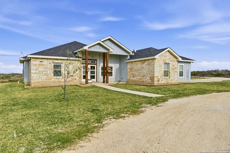 Front exterior of a new home in , Uvalde, TX, highlighting curb appeal (Image 1). Front exterior of a new home in , Uvalde, TX, highlighting curb appeal (Image 1).