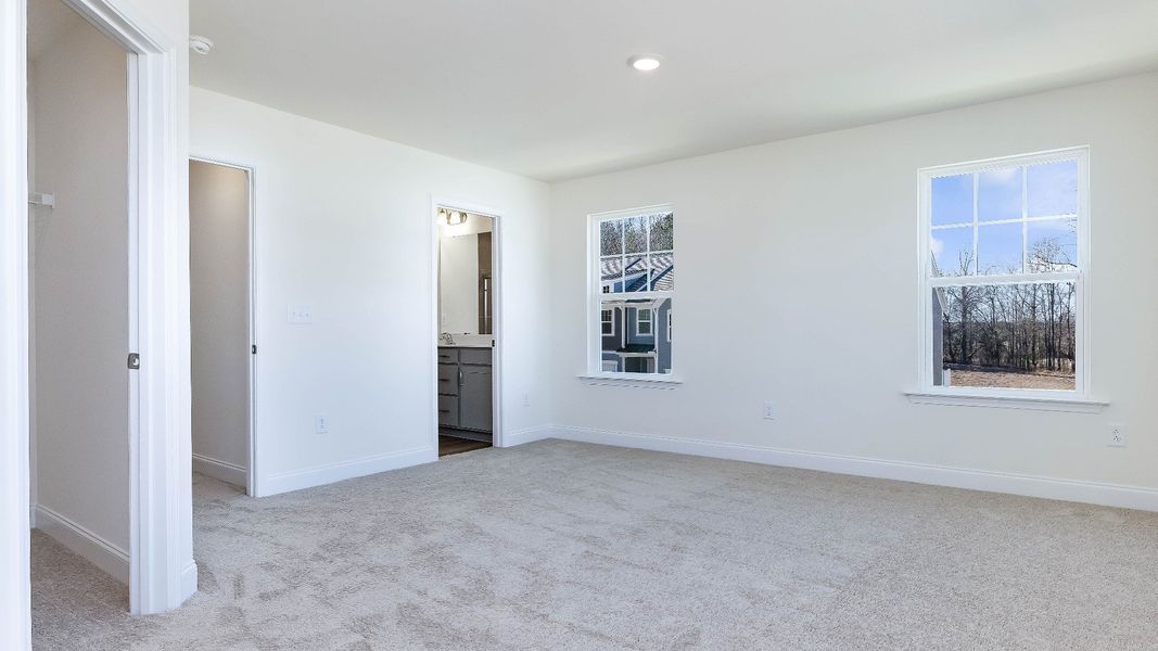 Furnished interior view inside a new home in Battle Bridge, Raleigh (Image 28).