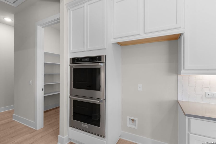 Furnished interior view inside a new home in Davis Ranch, San Antonio (Image 11).