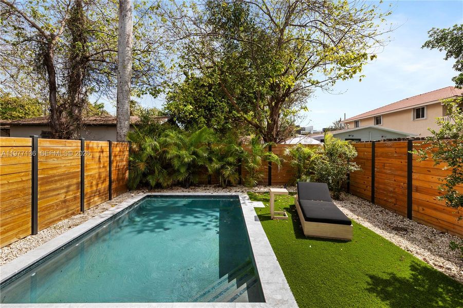 Exterior details and patio area of a home in , Miami (Image 4).