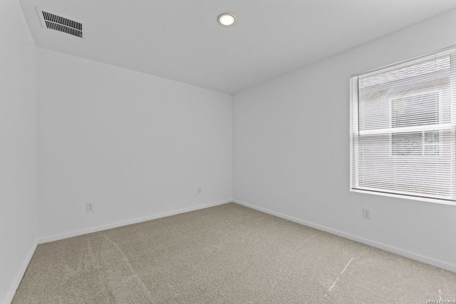 Spacious, unfurnished interior of a new home in Higdon Crossing, San Antonio (Image 28).