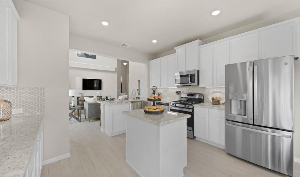 Kitchen with island (*Photo not of actual home and used for illustration purposes only.) Kitchen with island (*Photo not of actual home and used for illustration purposes only.)
