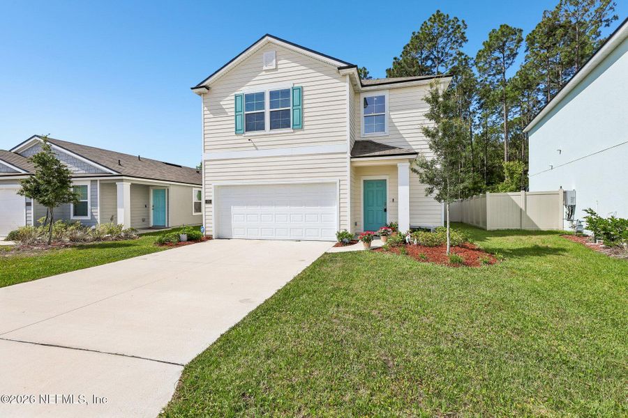 Front exterior of a new home in , St. Augustine, FL, highlighting curb appeal (Image 23).