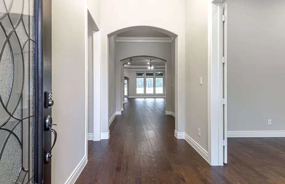 Representative unfurnished interior of a home built from the 3616 by Ravenna Homes in Artavia 70′, Conroe (Image 20).