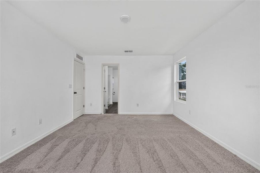 Spacious, unfurnished interior of a new home in , Port Charlotte (Image 41).