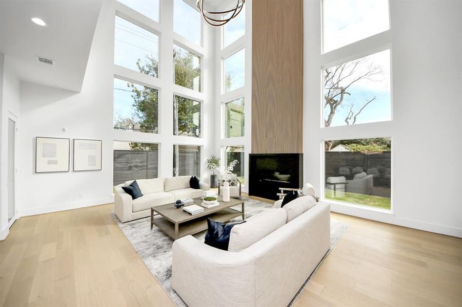 Expansive windows throughout the home flood every space with an abundance of natural light.