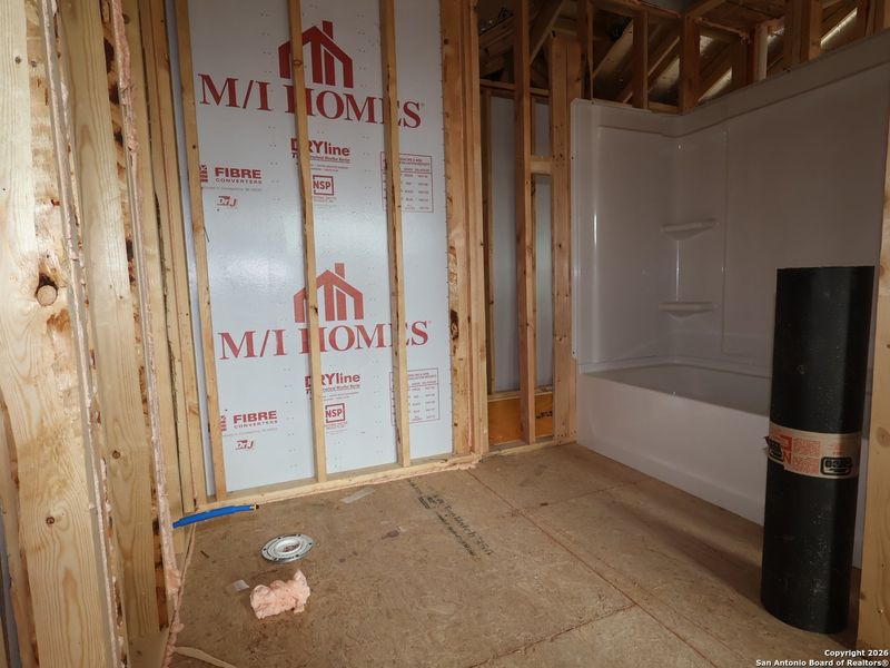 In-progress construction of a new home in Greenspoint Heights, Seguin, TX (Image 25).