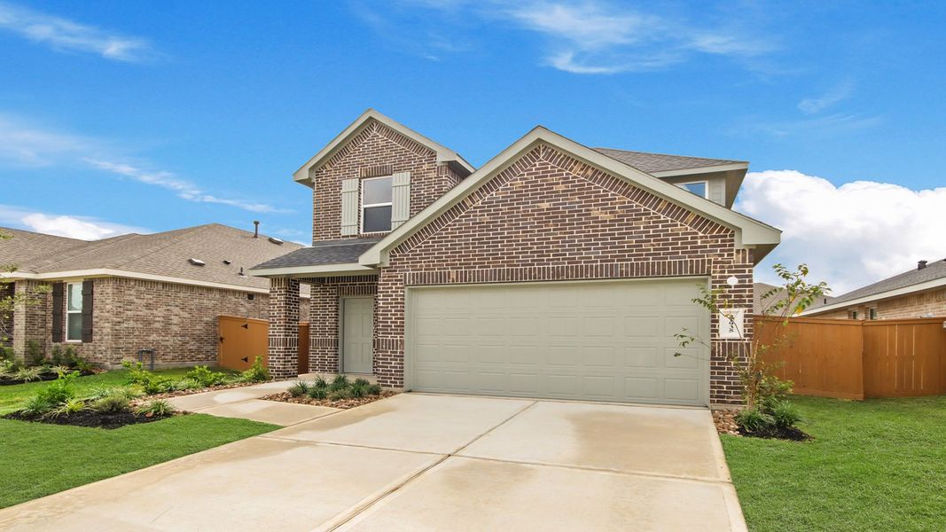 Front exterior of a new home in Cypress Green, Hockley, TX, highlighting curb appeal (Image 2). Front exterior of a new home in Cypress Green, Hockley, TX, highlighting curb appeal (Image 2).
