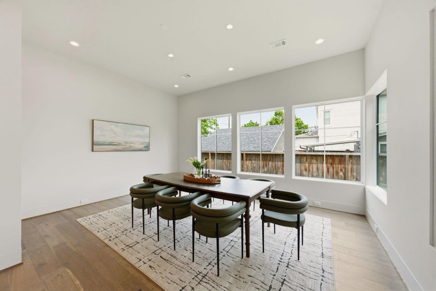 Dining off the kitchen. Very versatile for every day or special events. (Dining chandelier to be installed).