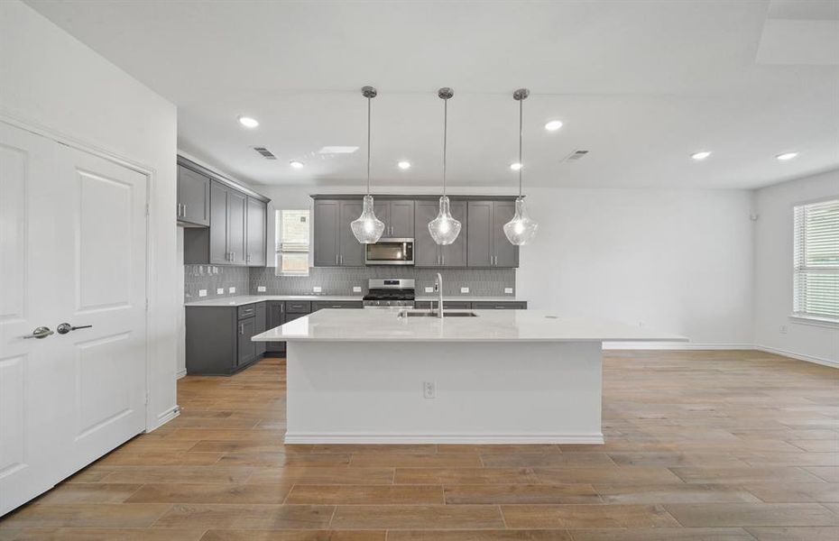 Furnished interior view inside a new home in Sunterra, Katy (Image 8).
