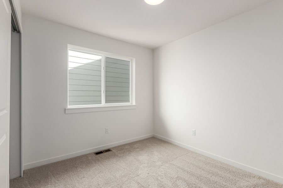 Spacious, unfurnished interior of a new home in Parkside at Victory Ridge, Colorado Springs (Image 23).