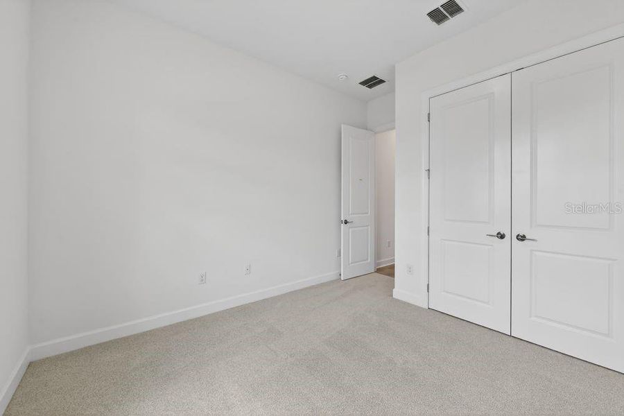 Spacious, unfurnished interior of a new home in Coasterra Community Group Page, Palmetto (Image 20).