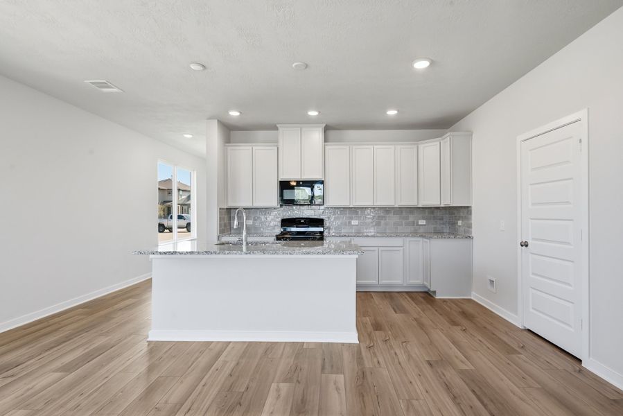Furnished interior view inside a new home in Heartland at Creek Meadows, College Station (Image 4).