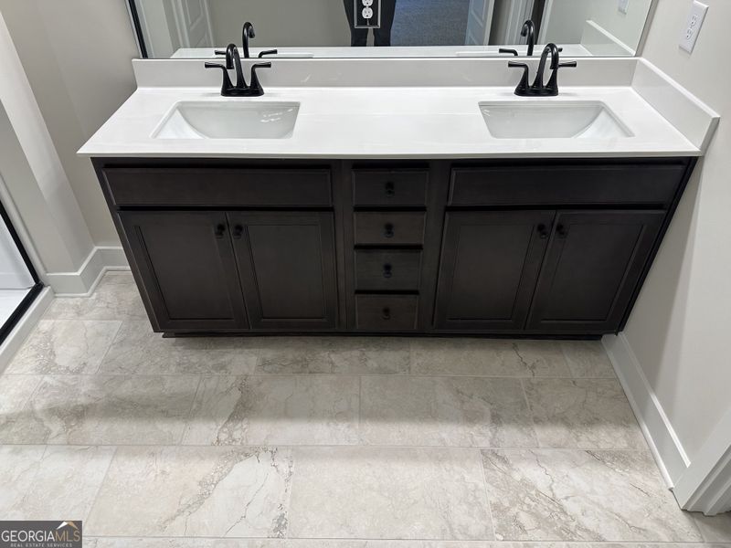 Furnished interior view inside a new home in Millstone at Mundy Mill, Gainesville (Image 25).