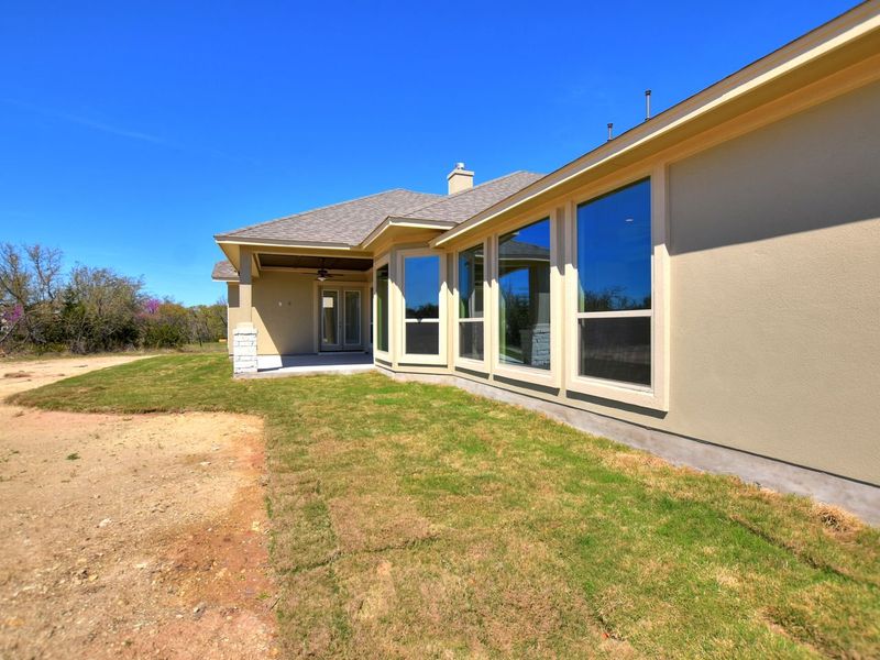 Representative exterior details of a home built from the San Simeon I by Giddens Homes in Clearwater Ranch, Liberty Hill (Image 113).