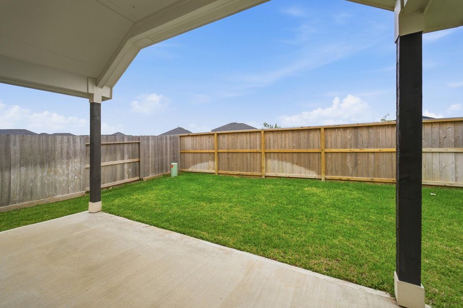 Exterior details and patio area of a home in Mulberry Farms, Santa Fe (Image 2).