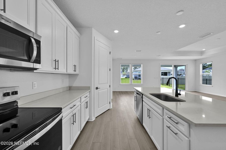 Furnished interior view inside a new home in Hyland Trail, Green Cove Springs (Image 9).