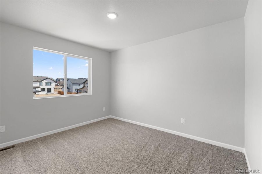 Spacious, unfurnished interior of a new home in Cherry Meadows, Brighton (Image 21).