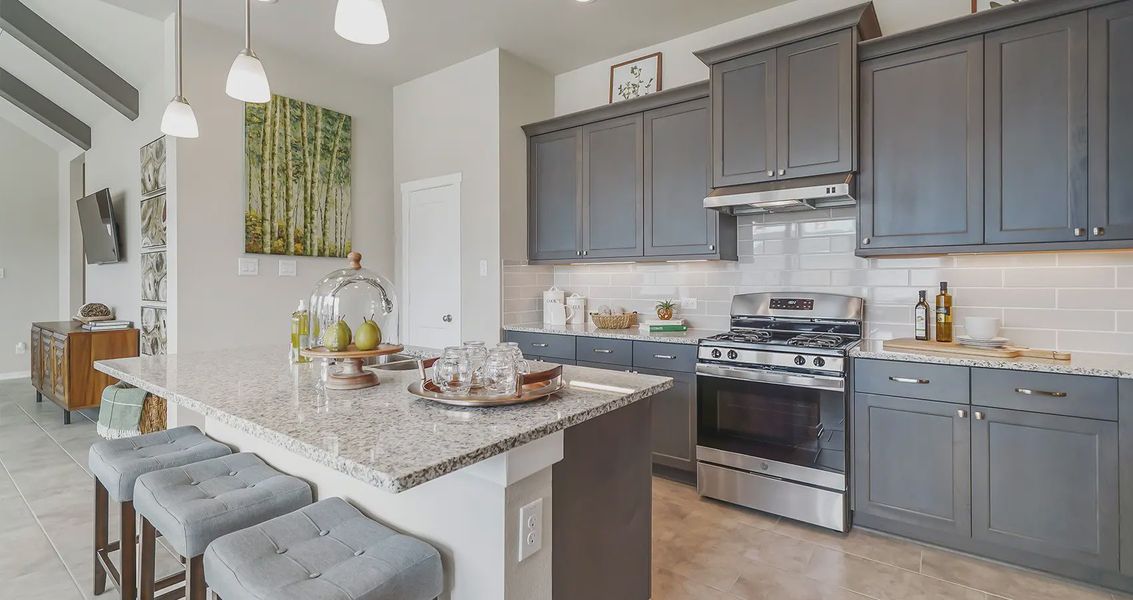 Representative furnished interior of a home built from the Orlando by Chesmar Homes in The Trails, New Caney (Image 5).