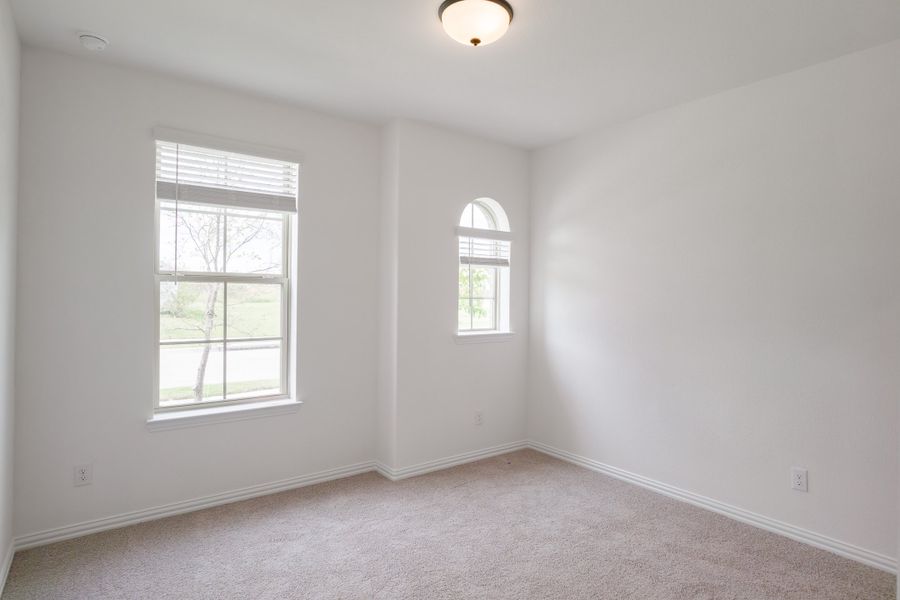 Spacious, unfurnished interior of a new home in Whitewing Trails, Princeton (Image 23).