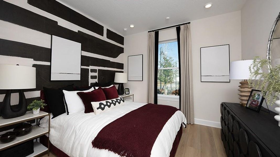Furnished interior view inside a new home in Esplanade at McKinnon Groves, Winter Garden (Image 12).