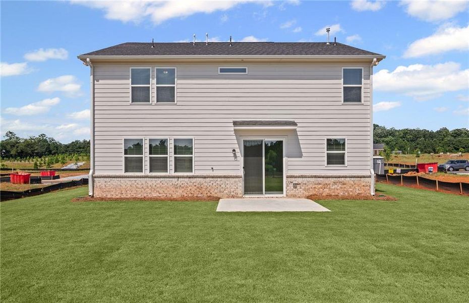 Exterior details and patio area of a home in Overland, Locust Grove (Image 3).