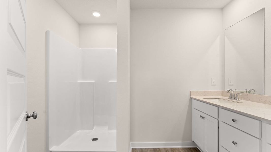 Representative furnished interior of a home built from the Palm Exterior by D.R. Horton in Genoa Landing Townhomes, Freeport (Image 11).