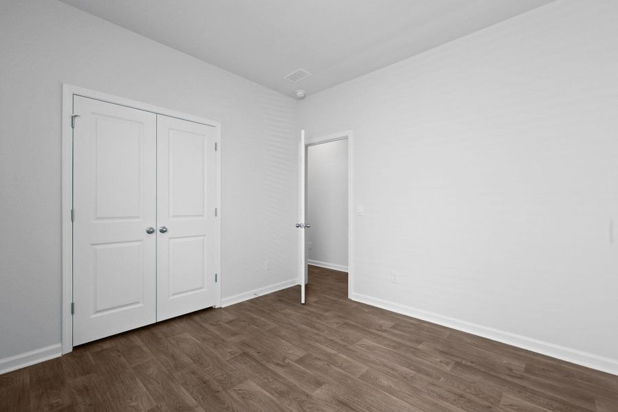 Spacious, unfurnished interior of a new home in Pine Hills at Cane Bay, Summerville (Image 18).