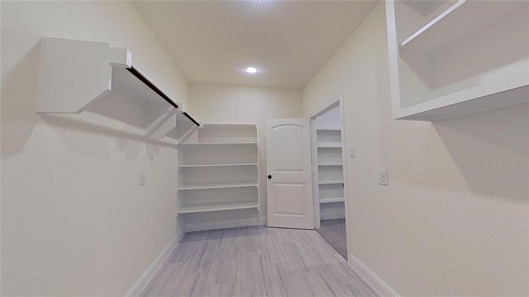 Laundry area featuring hookup for a gas dryer, hookup for an electric dryer, and washer hookup Laundry area featuring hookup for a gas dryer, hookup for an electric dryer, and washer hookup