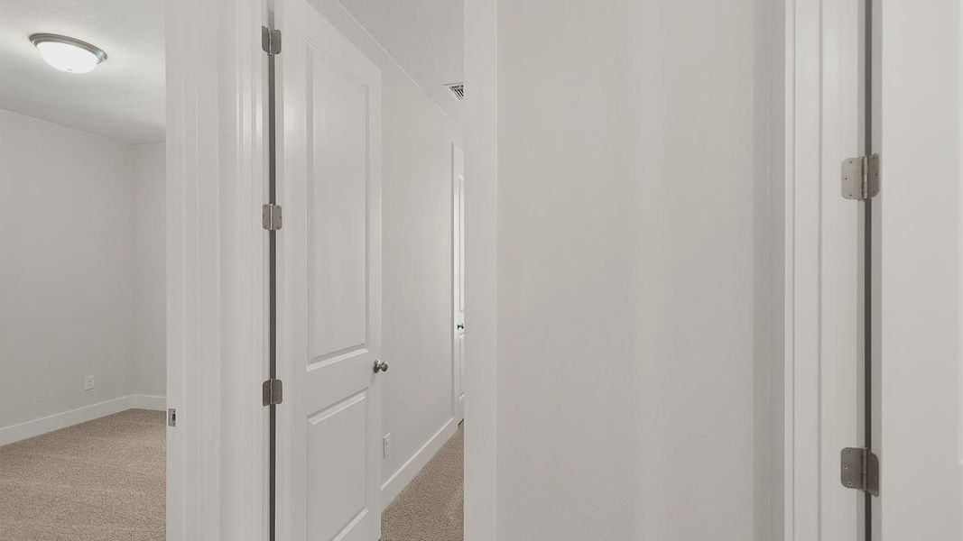 Representative unfurnished interior of a home built from the Brenner by Chesmar Homes in Newhaven, Manor (Image 29).
