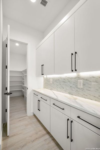 Furnished interior view inside a new home in , El Paso (Image 13).