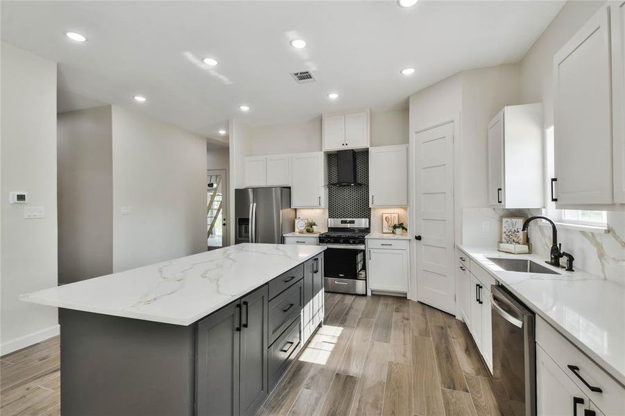 Specious walk-in pantry and lots of counter space.