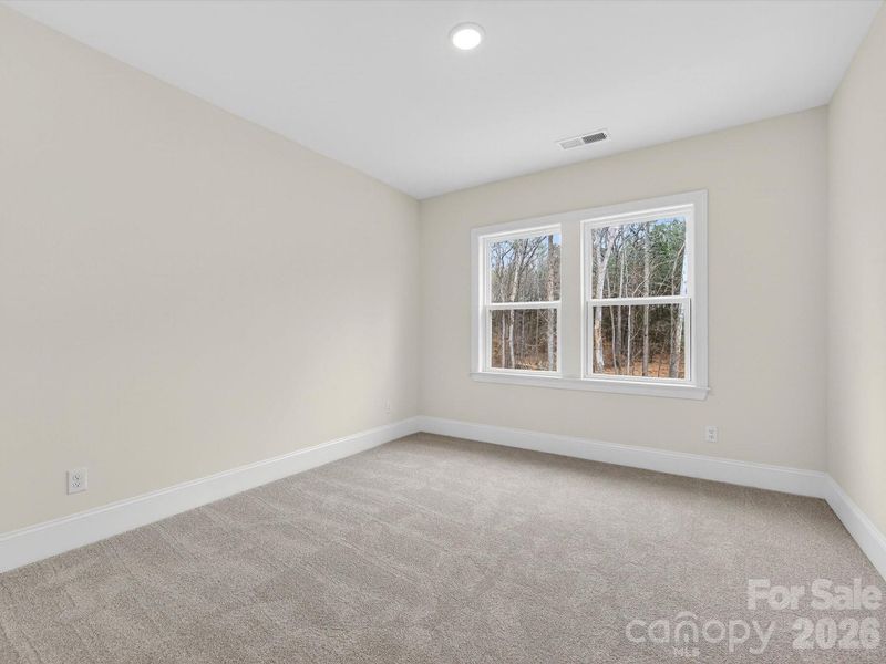 Spacious, unfurnished interior of a new home in North Creek Village, Huntersville (Image 39).