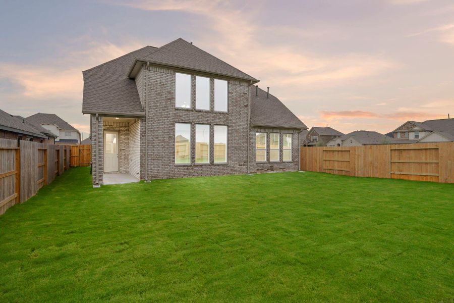 This backyard is perfect for family gatherings, social events, or simply unwinding in the fresh air.