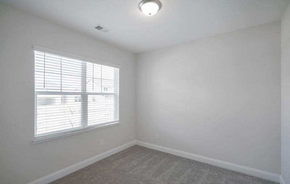 Representative unfurnished interior of a home built from the The McKee by Cothran Homes in Holly Ridge, Greenville (Image 21). Representative unfurnished interior of a home built from the The McKee by Cothran Homes in Holly Ridge, Greenville (Image 21).