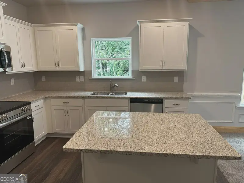 Furnished interior view inside a new home in Canterbury Villas, Carrollton (Image 5).