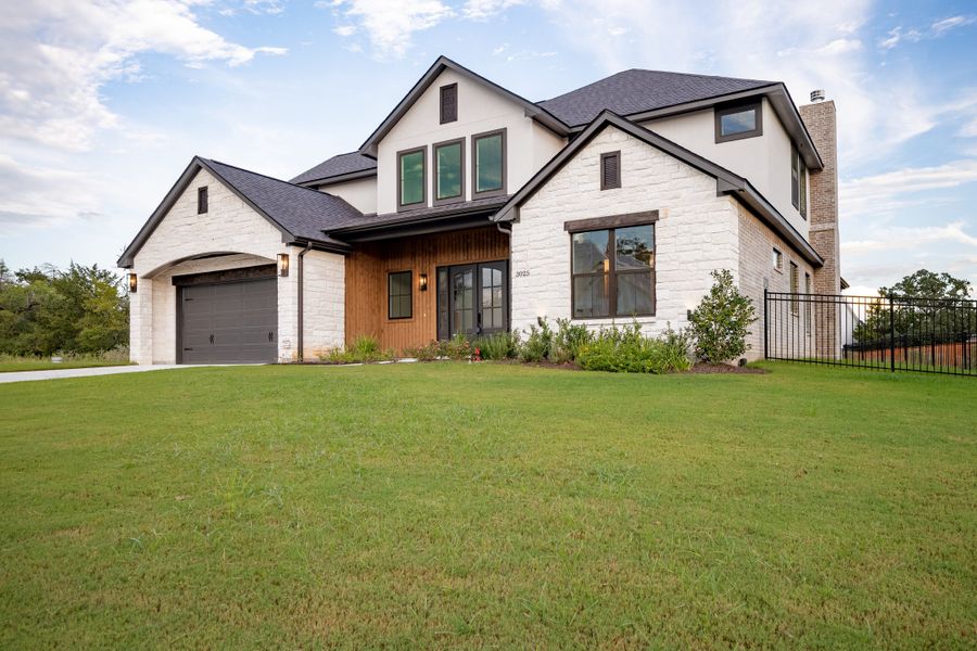 Representative exterior photo of a completed home built from the The Stella by Reece Homes in Traditions, Bryan, TX (Image 31).