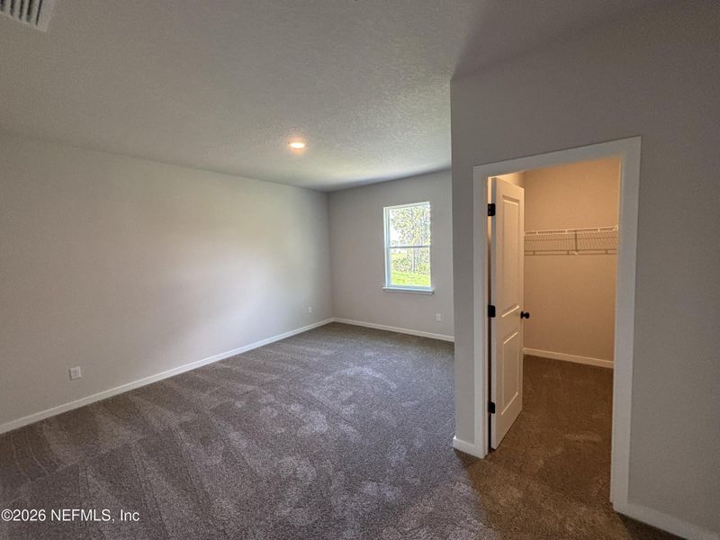 Spacious, unfurnished interior of a new home in Reserve East, Flagler Beach (Image 19).