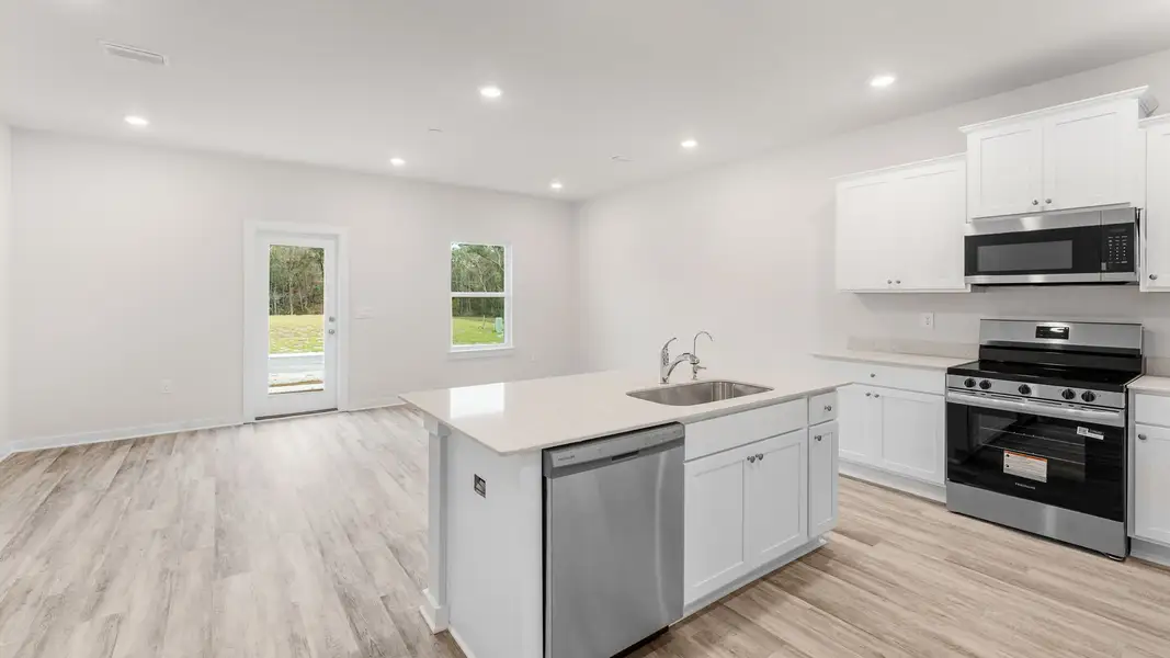 Furnished interior view inside a new home in Genoa Landing Townhomes, Freeport (Image 5).
