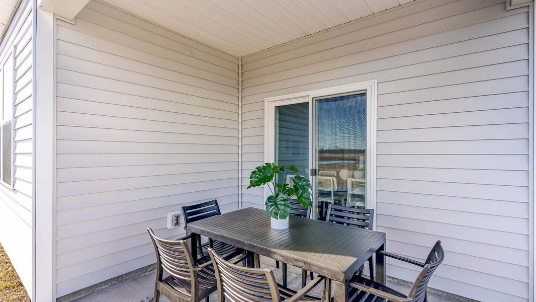 Furnished interior view inside a new home in Rich Square at Brunswick Plantation, Ash (Image 3).