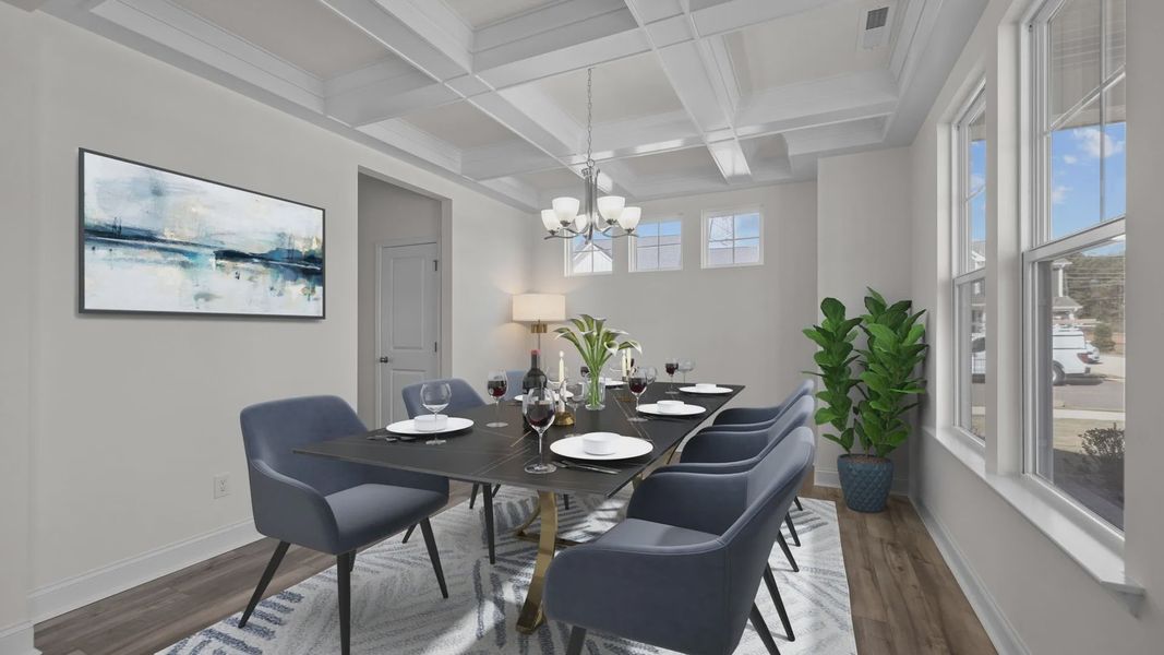 Fairfield design dining with elevated coffered ceiling and large windows, at Lakeside Glen by DRB Homes, York, SC.